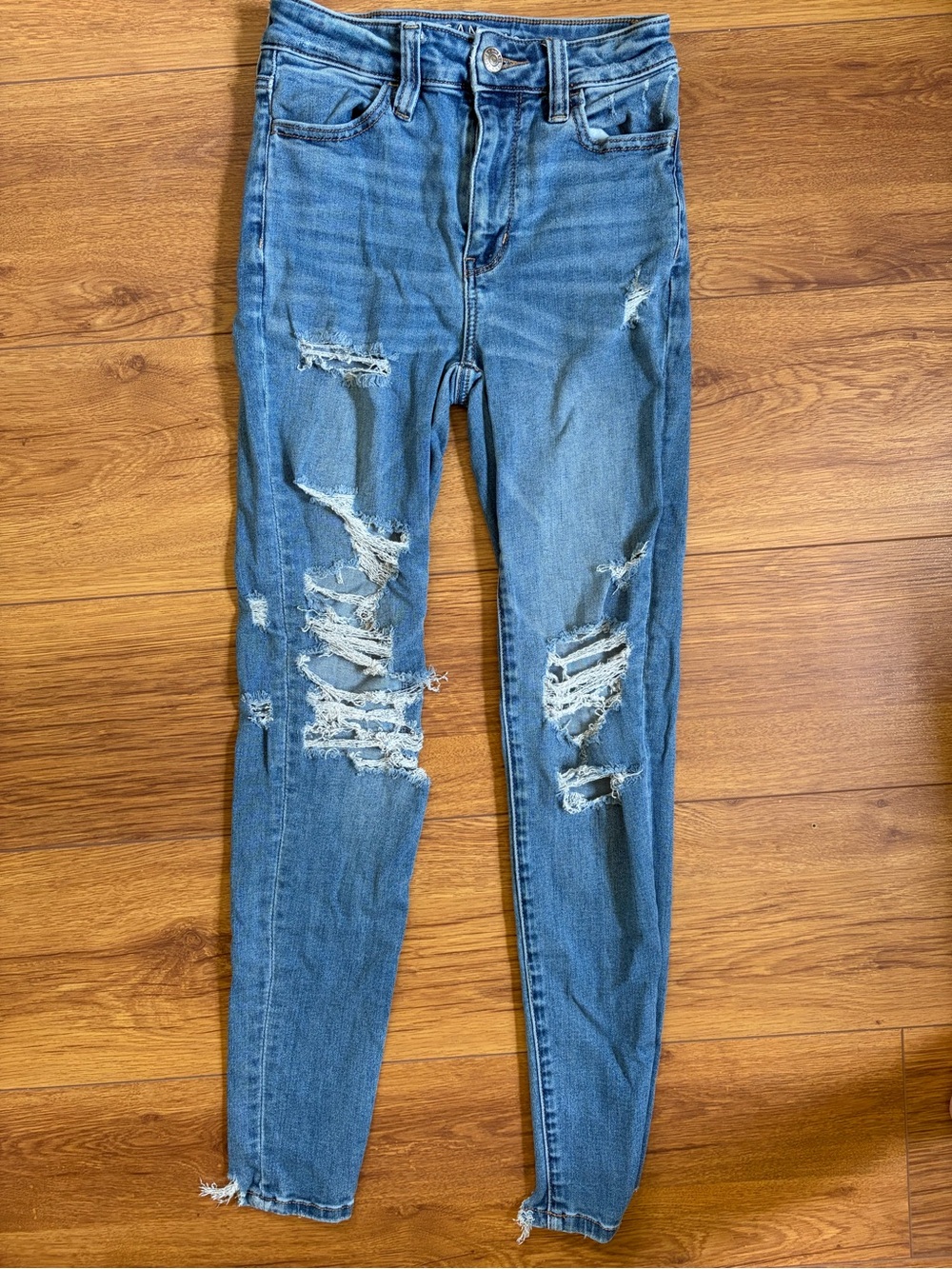 High- Waisted American Eagle Outfitters Ripped Medium Blue Skinny Jeans 0
